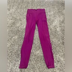 Never worn- lulu lemon insulated magenta leggings size 6